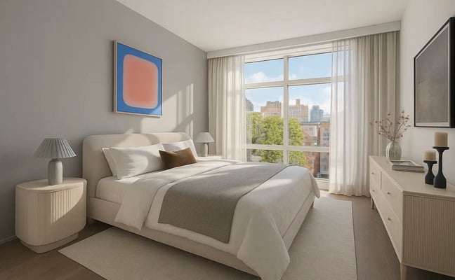 Bright furnished apartment living room with modern sofa, coffee table, and large windows